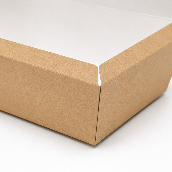 Close up of the kraft board corner showing the 500 GSM material and folded grease resistant seam