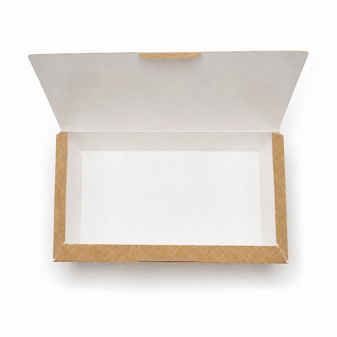 Top down view of the open kraft fish and chip box showing the white greaseproof interior